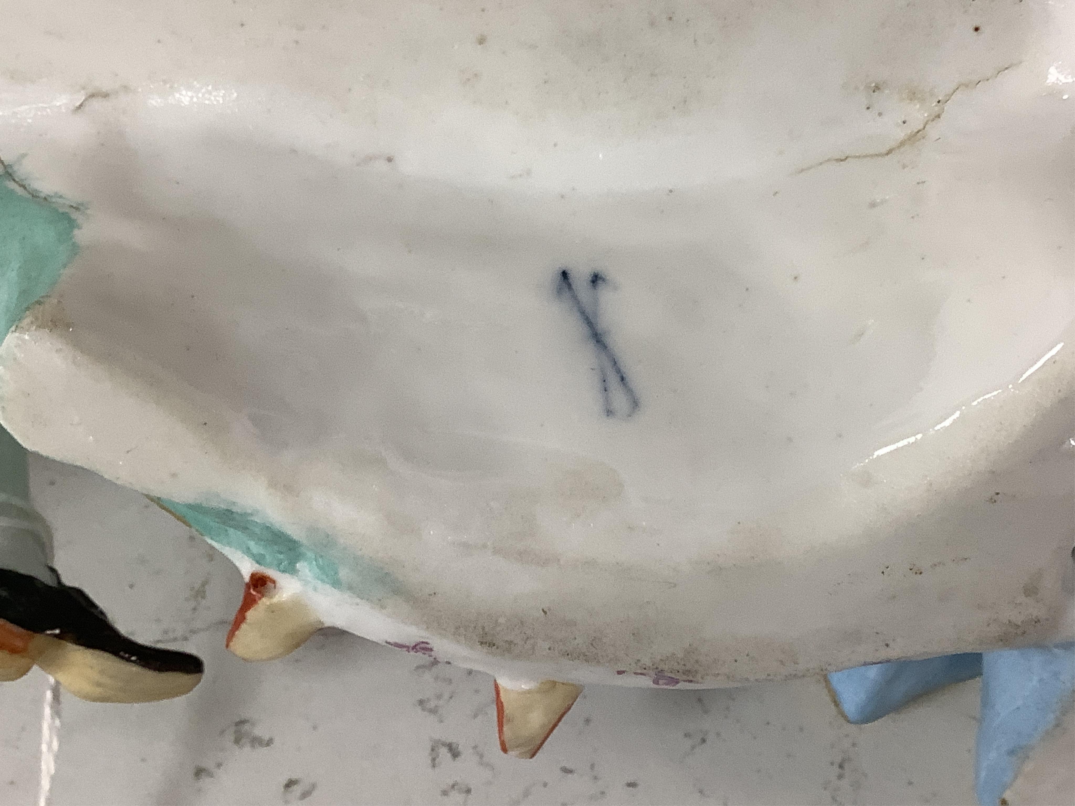 A Meissen style porcelain musical group, a figurine of a lady holding grapes and a two Derby figures of Summer and Autumn, c.1810-30, largest 24cm high